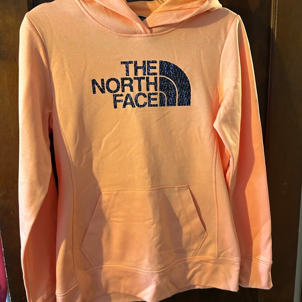 The North Face Orange Sweatshirt hoodie. Never worn.